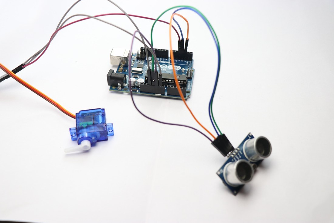 Controller board connected to a servo and a sensor