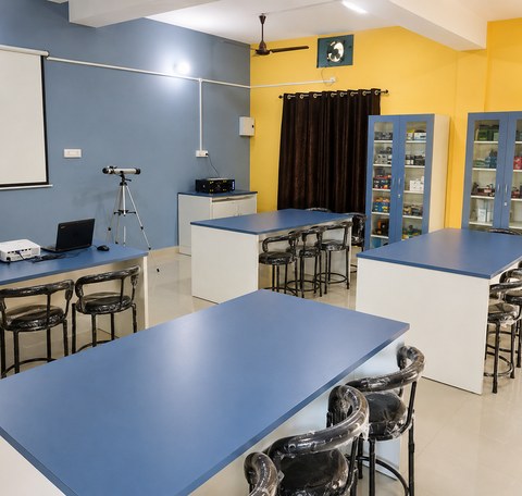 Blue worktables, equipment cabinets and a telescope